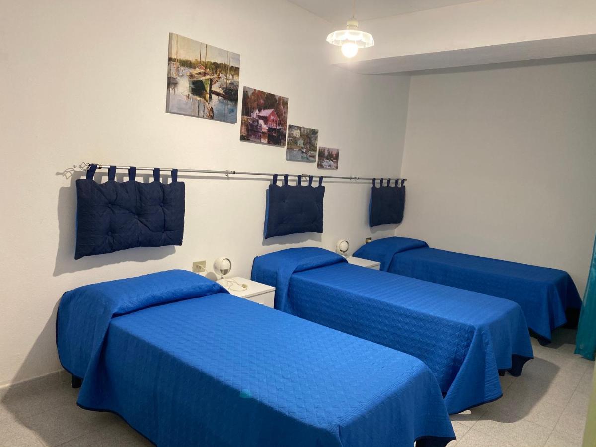 La Casa Gialla Кала Гононе Екстериор снимка