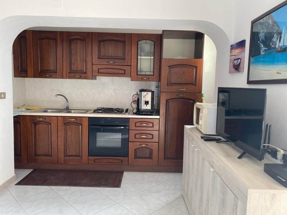 La Casa Gialla Кала Гононе Екстериор снимка